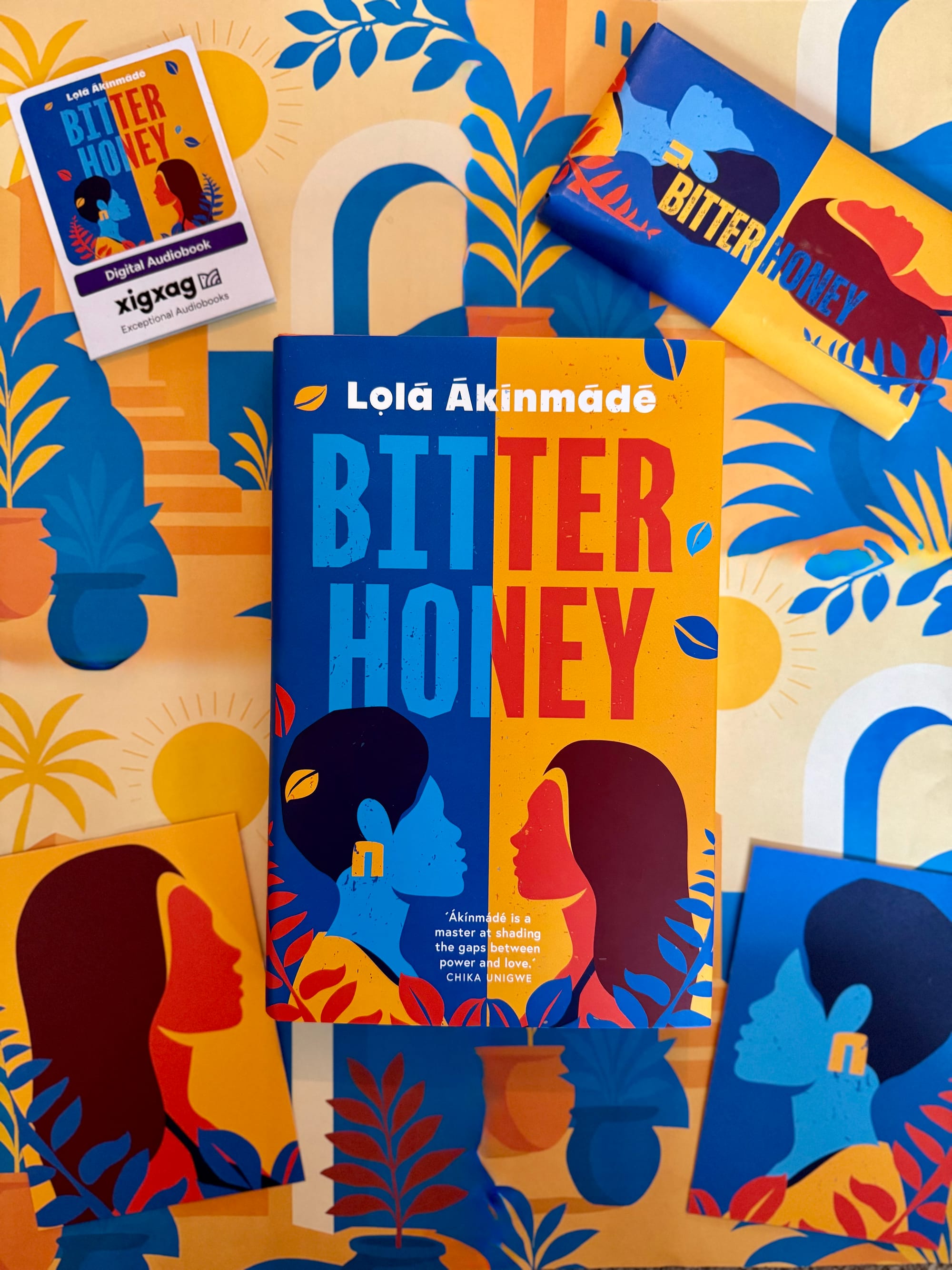 Book titled "Bitter Honey" on a colorful background with bold illustrations of faces. Includes text: "Akinmade is a master..." by Chika Unigwe.