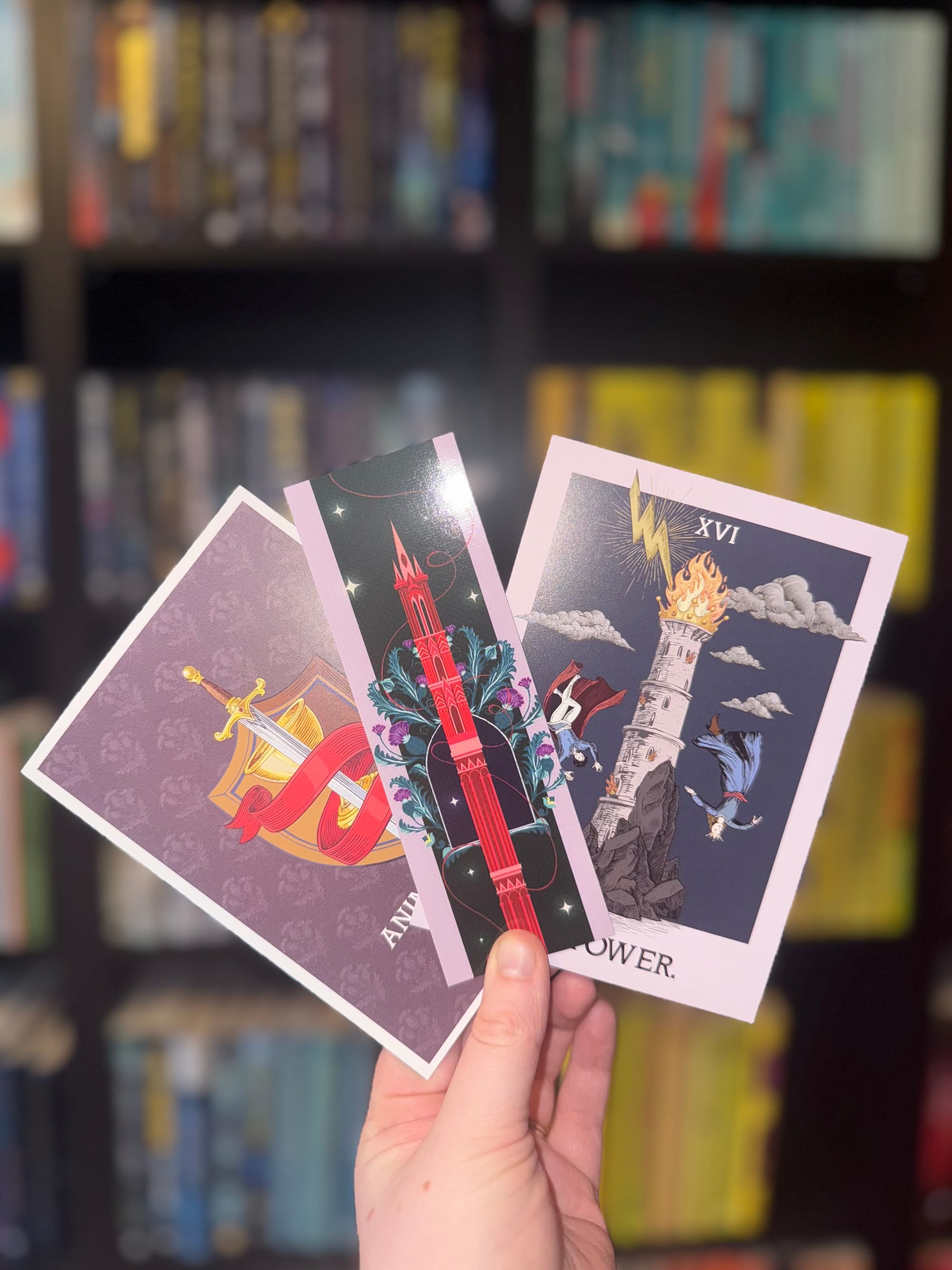 A hand holding promotional material. 